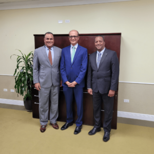 The Hon. Michael Halkitis, Deodat Maharaj and PS Wayde Watson (Left to right)